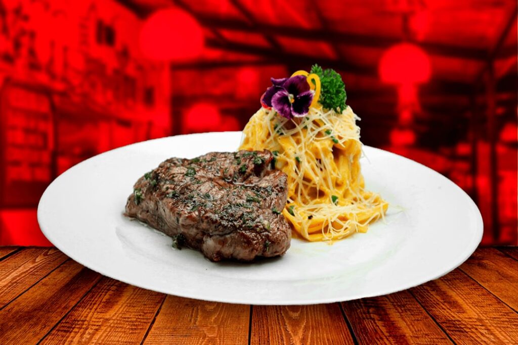 Lomo fino a la parrilla con fettuccine a la huancaína