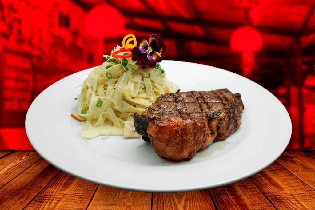 Picaña de res a la parrilla con fettuccine
